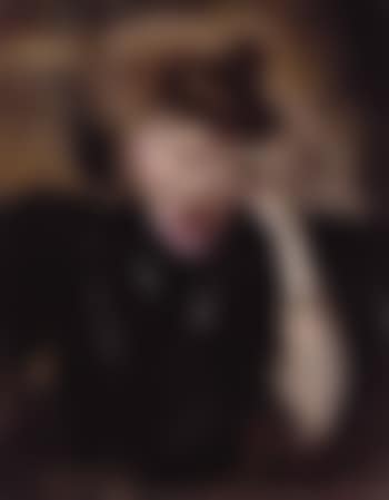 Portrait of young girl wearing black dress and pink scarf (preview)