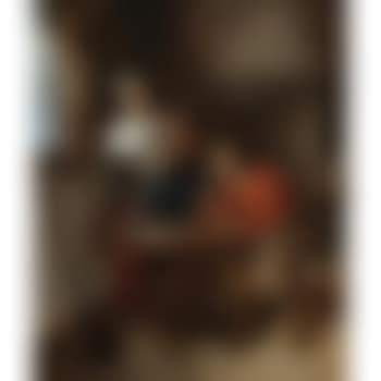 Young woman pouring beer and young man smoking in interior (preview)