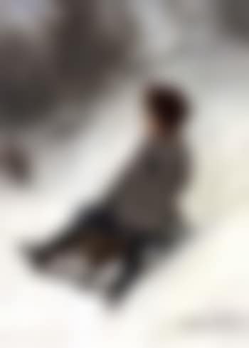 Small girl on toboggan (preview)