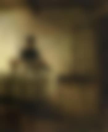 Interior scene with young girl setting the table (preview)