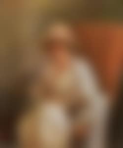 Portrait of seated woman wearing pale dress (preview)