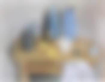 Still life of lemons, bottles, a bowl and a jug on a table (preview)