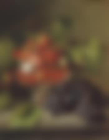 Strawberries in a glass bowl with grapes on a ledge (preview)