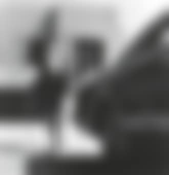 Woman in Chanel Suit, Smoking, Walking, Frank Lloyd Wright House in Background (preview)