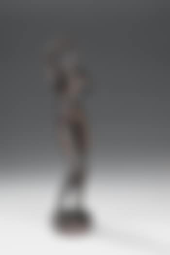 Standing woman combing her hair (preview)