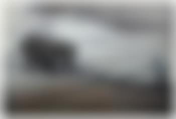 Shire horses pulling a plough, with farm hand beyond (preview)