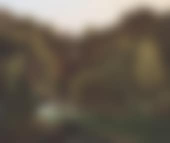 A view of Tivoli, with a traveller resting on the bank in the foreground (preview)