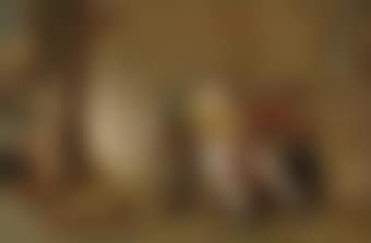 An elderly couple by the fire in an interior (preview)