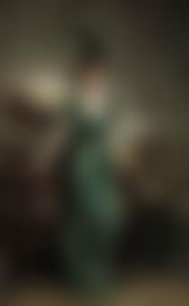 Portrait of the Hon Mrs Ernest Guinness, standing, full-length, wearing an emerald dress and feather (preview)