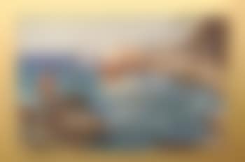 Figures and fishing boats on a coastline (preview)