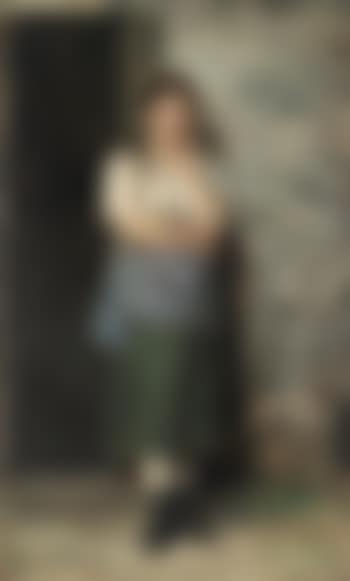 Girl leaning against the wall of a house (preview)