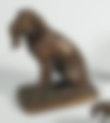 Un chien de chasse tenant en sa gueule un volatile (preview)