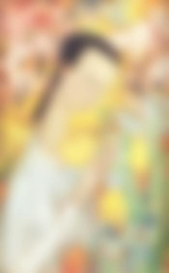 Jeune femme cueillant des fleurs dans un jardin (preview)