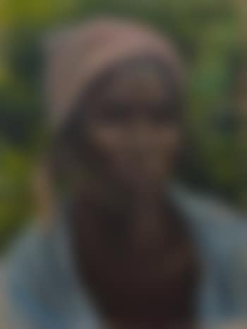 Portrait of a young African lady wearing a blue shawl (preview)