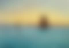Sunset over the sea with sailing ships (preview)