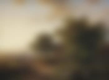 A mountainous landscape with a view on a town in the distance (preview)