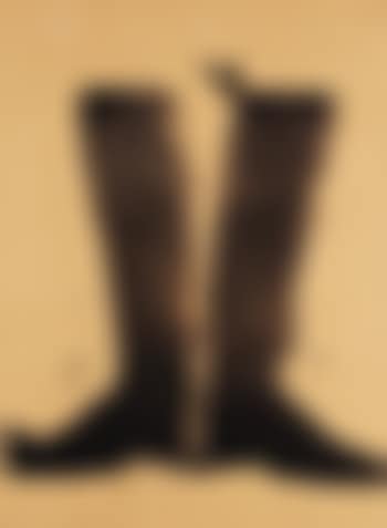 Silhouette black boots on brown paper (preview)