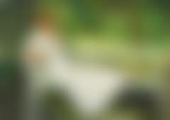 A young girl in a white dress, sitting on a bench in the garden of the Ancher family (preview)