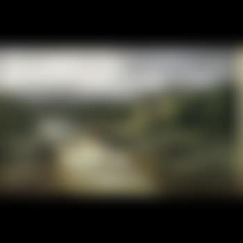 Water mill beside a rocky river (preview)