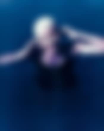 Woman with red lipstick in a swimming pool (preview)