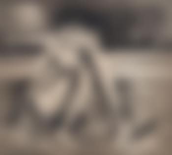 Seated woman on beach (preview)
