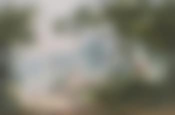 Figures in a wooded landscape; Fishermen on an estuary (preview)