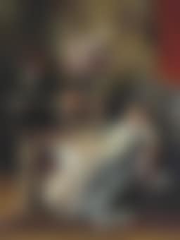 Young Woman sitting on a Sofa (preview)