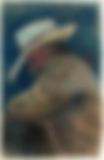 Robert Duncan leaning forward with hat (preview)