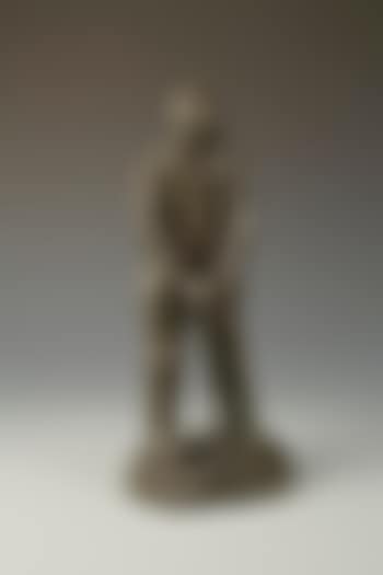 Man leaning against a spade (preview)