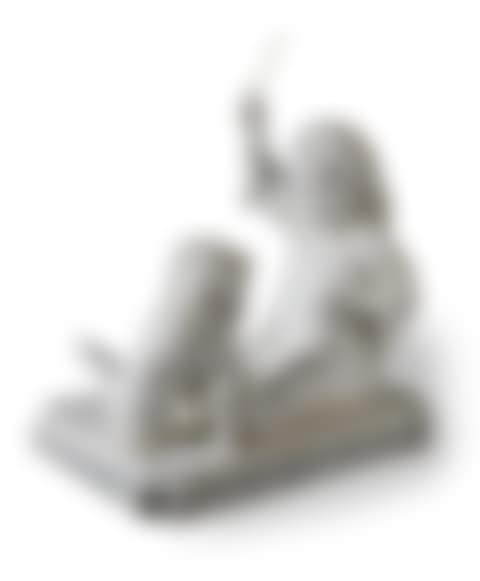 The girl seated with her right hand raised to the dog who has just spilt his bowl (preview)