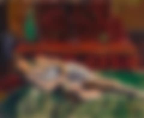 A FIGURE RECLINING ON A COUCH (preview)
