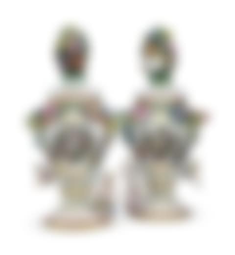 A PAIR OF FRUIT AND FLOWER ENCRUSTED VASES AND COVERS (preview)