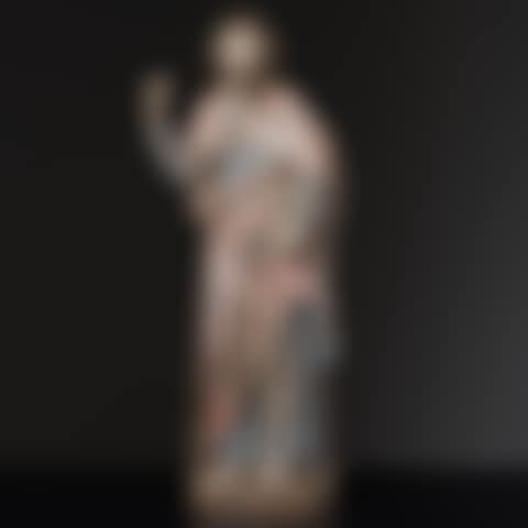 Saint Apostle Standing with his right hand raised and holding a book in the other hand, he is dressed in a tunic and a coat, one side of which falls to the front (preview)