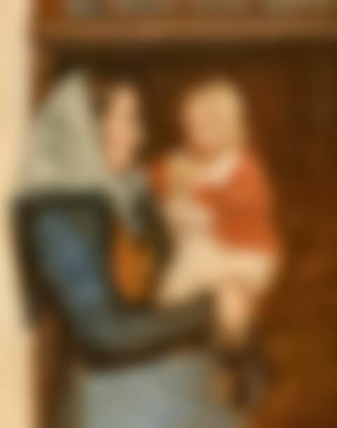 A woman from Skagen standing in the doorway holding her child (preview)