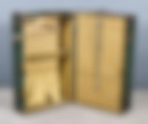 An Early 20th Century Green Painted and Metal Mounted Travelling Wardrobe; an early 20th century brown painted and metal mounted travelling wardrobe (preview)