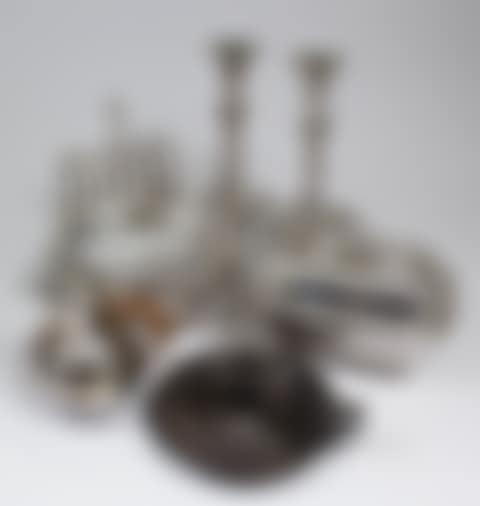 A pair of plated pillar candlesticks with leaf mounts (preview)