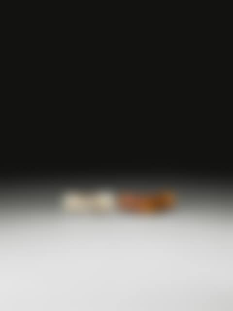 A PAIR OF TWO WHITE JADE SWORD GUARDS <br/>HAN DYNASTY (preview)