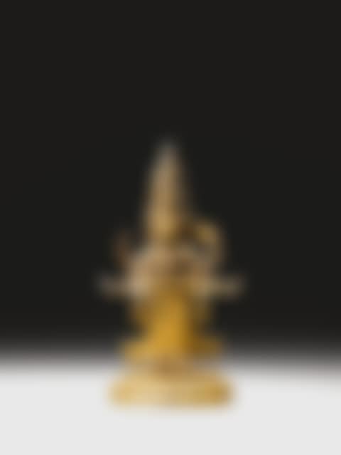 A GILT-BRONZE FIGURE OF ELEVEN-HEADED GUANYIN <br/>QING DYNASTY (preview)