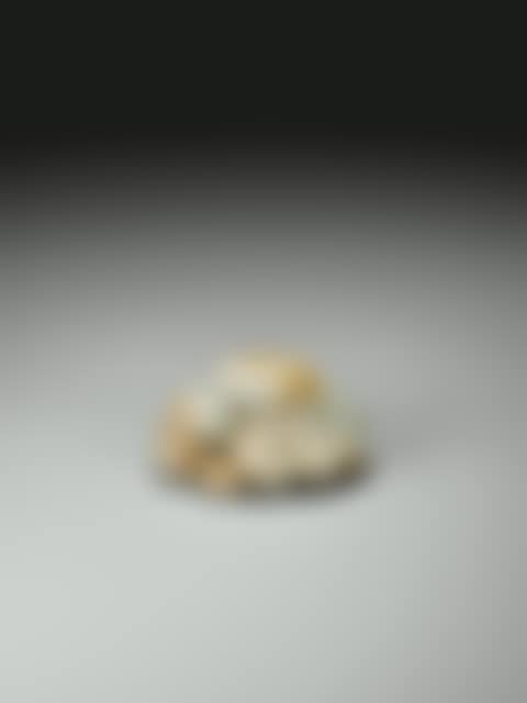 A CARVED CELADON JADE MYTHICAL BEAST <br/>QING DYNASTY (preview)