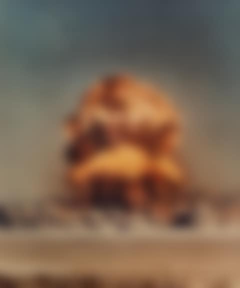 (NULCEAR EXPLOSION) A group of 4 large color photographs depicting various American atomic bomb tests in the 1950s, three at the Nevada Test Site and one at Bikini Atoll. (preview)