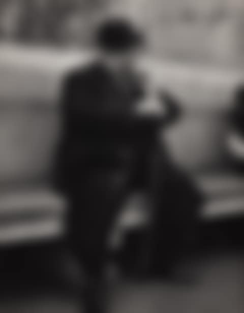 Man yawning on bench (preview)