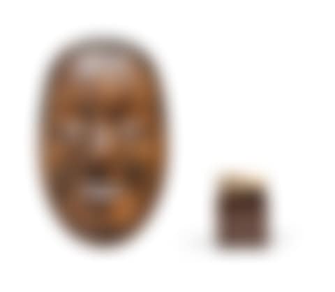 Masque en bois de théâtre Nô, et netsuke d'un singe en ivoire sculpté Japon, époque Meiji A wood Noh mask, and an ivory netsuke of a monkey Japan, Meiji period (preview)