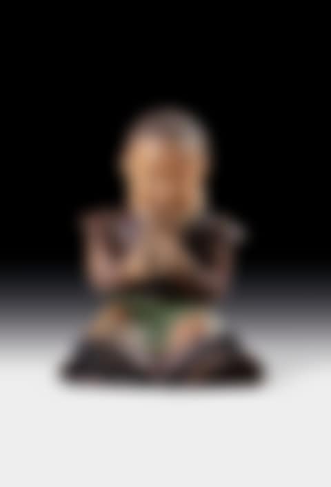 Seated child eating a waffle (preview)