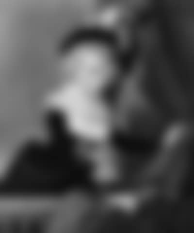 Portrait of woman with feathered hat standing on balcony (preview)