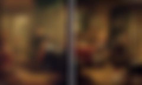 An alchemist at work, a woman and child beyond. A scholar in his study, a male servant lighting a stove beyond (preview)