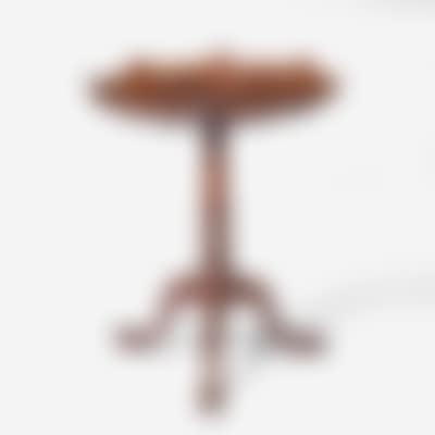 A George III carved mahogany tilt-top candlestand (preview)