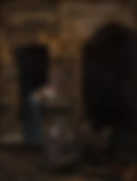 A man and woman by a doorway (preview)