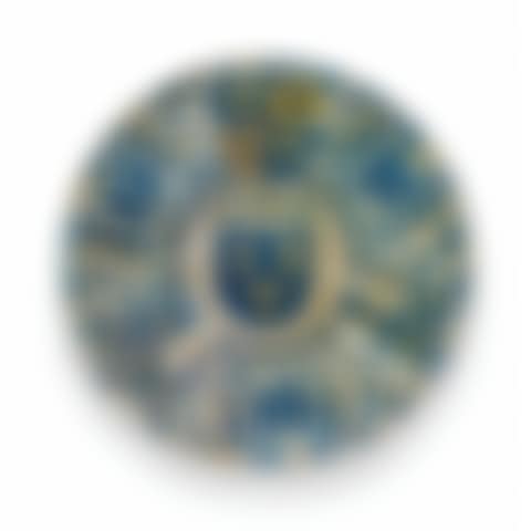 AN HISPANO-MORESQUE EARTHENWARE BLUE AND LUSTRED ARMORIAL CHARGER (preview)