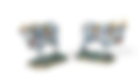 A PAIR OF DUTCH DELFT POLYCHROME MODELS OF STANDING COWS (preview)