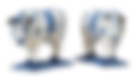 A PAIR OF DUTCH DELFT BLUE AND WHITE MODELS OF STANDING COWS (preview)